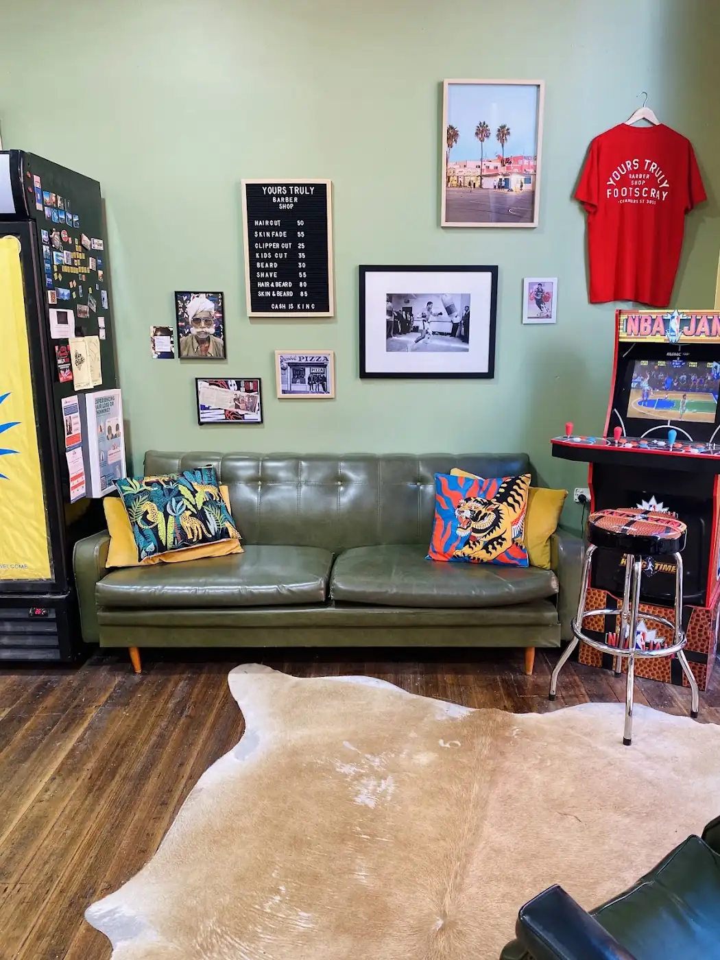 Couch and green wall