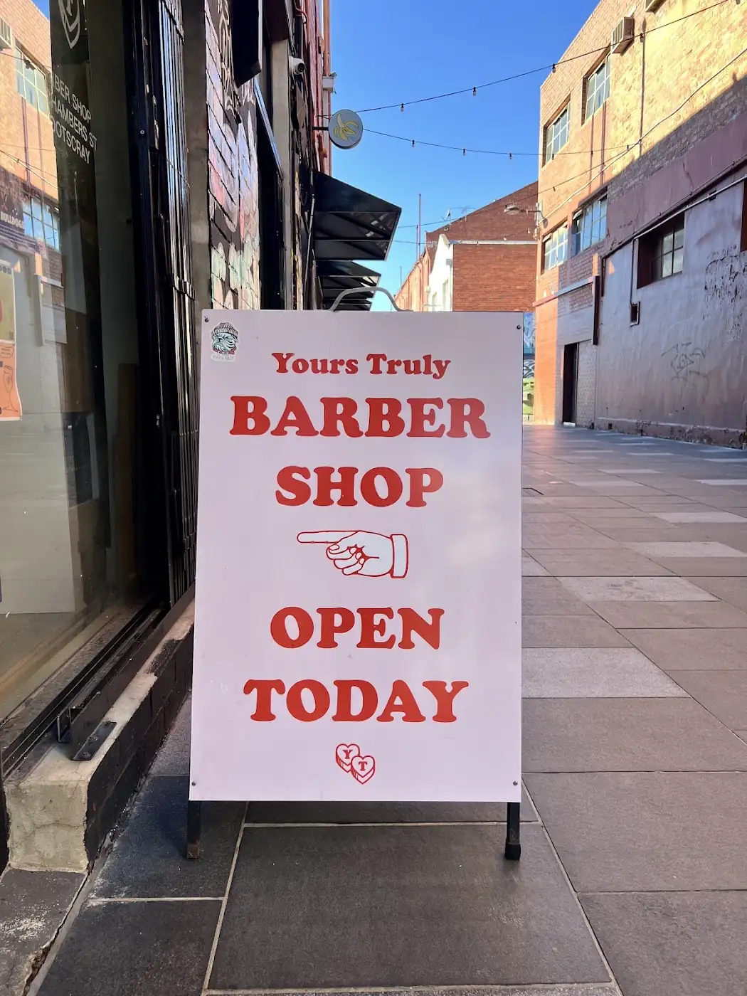 Open today sign at the shop